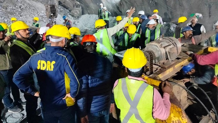 Members of rescue teams are pictured during a rescue operation after a portion of an under-construction tunnel collapsed in Uttarkashi in the northern state of Uttarakhand, India, November 13, 2023. Uttarakhand State Disaster Response Force/Handout via REUTERS THIS IMAGE HAS BEEN SUPPLIED BY A THIRD PARTY. NO RESALES. NO ARCHIVES. REFILE - CORRECTING MONTH