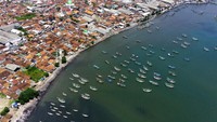 Foto udara panorama Pelabuhan perikanan Muncar di Banyuwangi, Jawa Timur, Rabu (15/11/2023).  