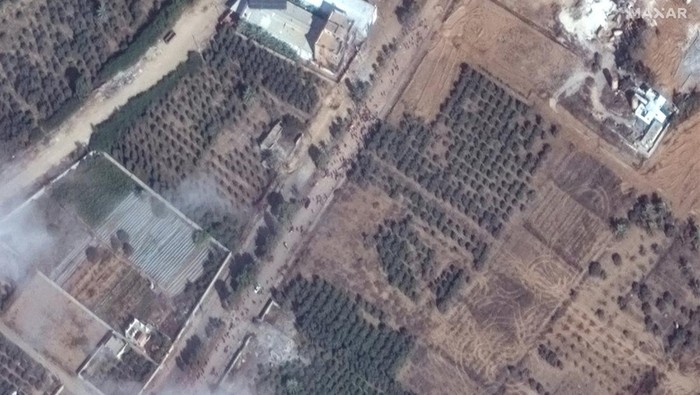 A satellite image shows people walking on Salah Al Deen road, near Gaza City, in Gaza November 17, 2023. Satellite image 2023 Maxar Technologies/Handout via REUTERS THIS IMAGE HAS BEEN SUPPLIED BY A THIRD PARTY. NO RESALES. NO ARCHIVES. MANDATORY CREDIT. DO NOT OBSCURE LOGO.