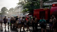 Bahkan mobil pemadam juga diturunkan untuk mengatasi cuaca ekstrem tersebut. AFP/TERCIO TEIXEIRA