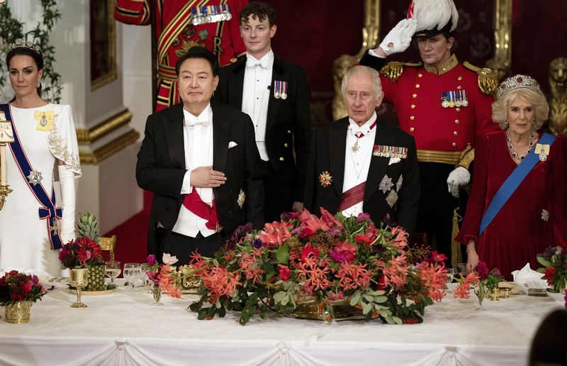 The Princess of Wales, President of South Korea Yoon Suk Yeol, King Charles III and Queen Camilla at the state banquet at Buckingham Palace, London, Tuesday, Nov. 21, 2023 for the state visit to the UK by President of South Korea Yoon Suk Yeol and his wife Kim Keon Hee. (Aaron Chown/Pool Photo via AP)