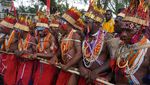 Potret Masyarakat Adat Papua Ikut Karnaval Budaya Hari Otsus
