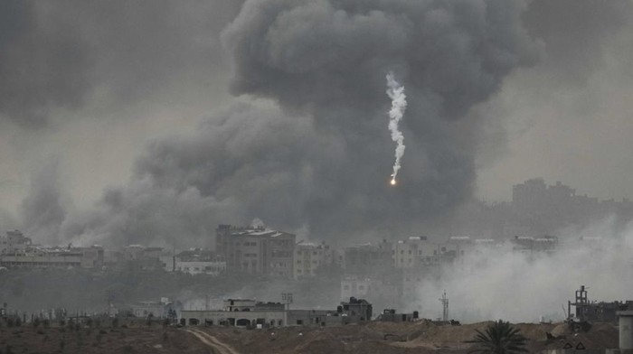 Smoke rises following an Israeli airstrike in the Gaza Strip, as seen from southern Israel, Wednesday, Nov. 22, 2023. (AP Photo/Leo Correa)