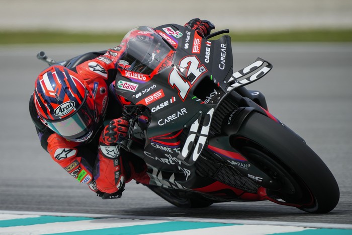 Aprilia Racings Spanish rider Maverick Vinales steers his bike during the first practice session of the MotoGP Malaysian Grand Prix at the Sepang International Circuit in Sepang, Malaysia, Friday, Nov. 10, 2023. (AP Photo/Vincent Thian)