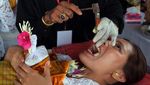 Melihat Lebih Dekat Ritual Potong Gigi Massal di Bali