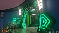 Berpindah ke gedung oval, di sini terdapat koridor memanjang yang akan membawa pengunjung memutar menelusuri zona-zona seperti zona panas bumi geothermal, zona sea life, ada pula zona teknologi di mana pengunjung bisa mencoba bermain VR dan magic step, serta zona KPU yang dibuat semirip mungkin dengan tempat pemungutan suara.