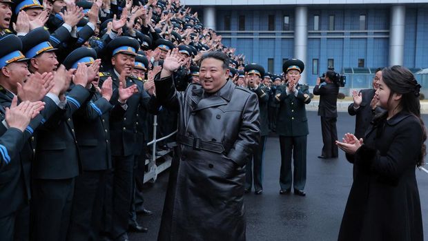 North Korea's leader Kim Jong-un waves during a visit to the General Administration of Aerospace Technology, in this picture released by the Korean Central News Agency on November 24, 2023. KCNA via REUTERS    ATTENTION EDITORS - THIS IMAGE WAS PROVIDED BY A THIRD PARTY. REUTERS IS UNABLE TO INDEPENDENTLY VERIFY THIS IMAGE. NO THIRD PARTY SALES. SOUTH KOREA OUT. NO COMMERCIAL OR EDITORIAL SALES IN SOUTH KOREA.