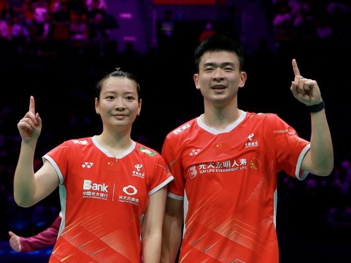 Chinas players Zheng Siwei (R) and Huang Yaqiong (L) react following the mixed doubles final match of the BWF World Tour China Masters 2023 badminton tournament against South Koreas Seo Seung Jae and Chae Yu Jung in Shenzhen, in Chinas southern Guangdong province on November 26, 2023. (Photo by AFP) / China OUT