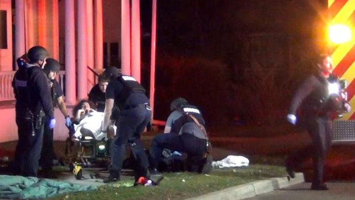 First responders treat a victim after a gunman shot and wounded three college students of Palestinian descent in Burlington, Vermont, U.S. November 25, 2023 in a still image from video. Courtesy Wayne Savage via REUTERS. Acquire Licensing Rights