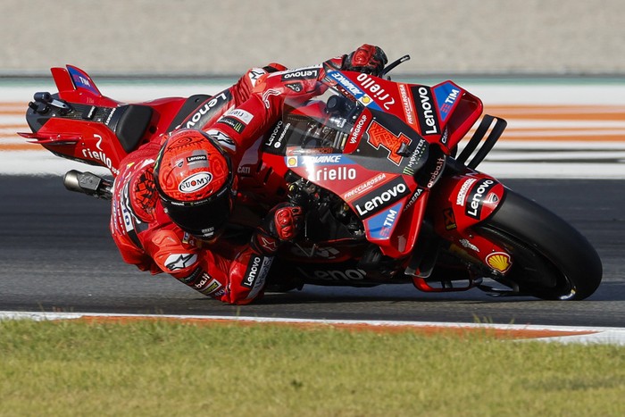 Italian rider Francesco Bagnaia of the Ducati Lenovo Team steers his motorcycle during warm up prior the MotoGP race of the Valencia Motorcycle Grand Prix, the last race of the season, at the Ricardo Tormo circuit in Cheste near Valencia, Spain, Sunday, Nov. 26, 2023. (AP Photo/Alberto Saiz)