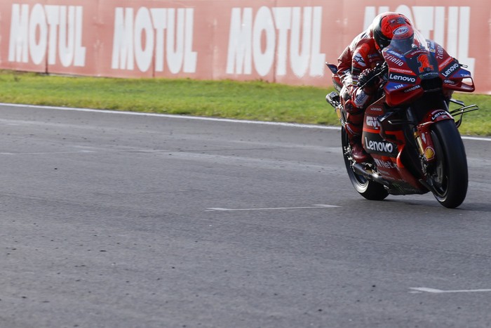 Italian rider Francesco Bagnaia of the Ducati Lenovo Team steers his motorcycle during warm up prior the MotoGP race of the Valencia Motorcycle Grand Prix, the last race of the season, at the Ricardo Tormo circuit in Cheste near Valencia, Spain, Sunday, Nov. 26, 2023. (AP Photo/Alberto Saiz)