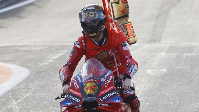 Italian rider Francesco Bagnaia of the Ducati Lenovo Team steers his motorcycle during warm up prior the MotoGP race of the Valencia Motorcycle Grand Prix, the last race of the season, at the Ricardo Tormo circuit in Cheste near Valencia, Spain, Sunday, Nov. 26, 2023. (AP Photo/Alberto Saiz)