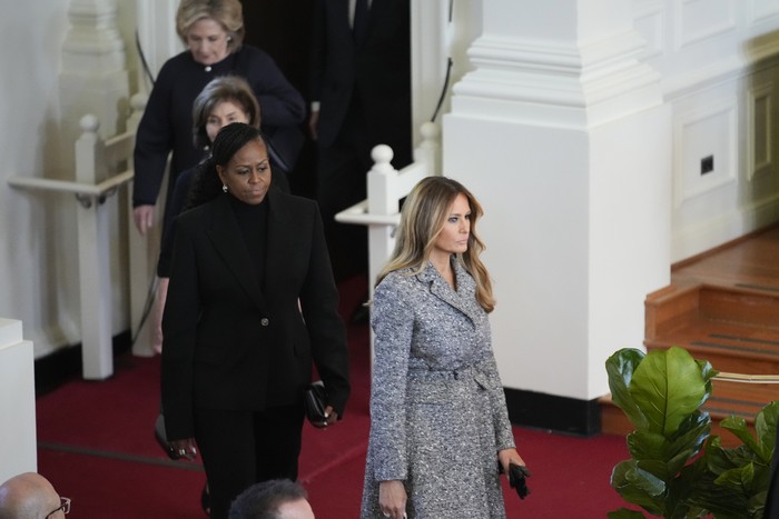 Former first ladies from right, Melania Trump, Michelle Obama, Laura Bush and Hillary Clinton, arrive for a tribute service for former first lady Rosalynn Carter, at Glenn Memorial Church, Tuesday, Nov. 28, 2023, in Atlanta. (AP Photo/Andrew Harnik)