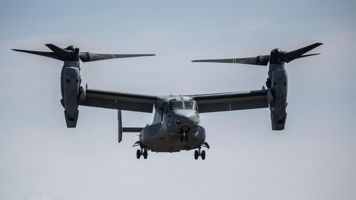 (FILES) This file photo taken on March 15, 2022 shows a US Marine Corps MV-22 Osprey tilt-rotor aircraft landing during a joint exercise with Japanese Self Defense Forces members at the Higashifuji training area in Gotemba, Shizuoka Prefecture. A US Osprey military aircraft with eight people on board crashed on November 29, 2023 off the coast of Japan, the coastguard said. (Photo by Charly TRIBALLEAU / AFP)
