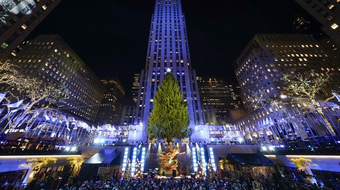 The Christmas tree at Rockefeller Center is lit in New York, Wednesday, Nov. 29, 2023. (AP Photo/Seth Wenig)