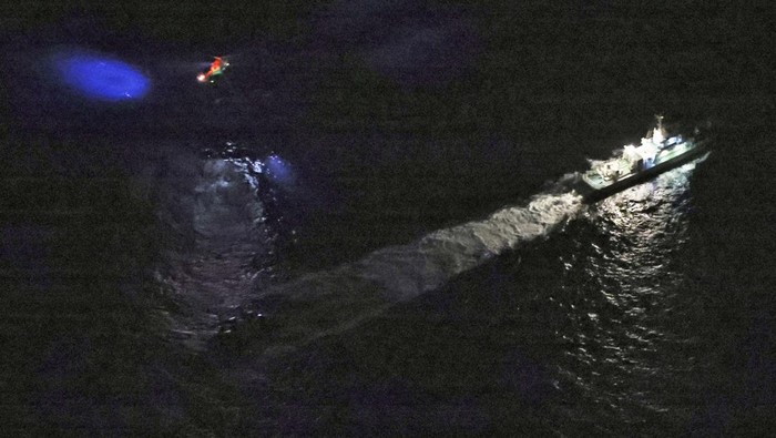 A looking-like life raft floating object believed to belong to the U.S. military aircraft MV-22 Osprey that crashed into the sea is seen off Yakushima Island, Kagoshima prefecture, western Japan November 29, 2023, in this handout photo taken by Japan Coast Guard airplane and provided by Japan Coast Guard. 10th Regional Coast Guard Headquarters - Japan Coast Guard/Handout via REUTERS ATTENTION EDITORS - THIS PICTURE WAS PROVIDED BY A THIRD PARTY. MANDATORY CREDIT