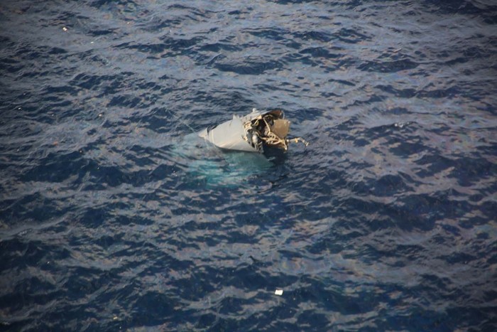 A looking-like life raft floating object believed to belong to the U.S. military aircraft MV-22 Osprey that crashed into the sea is seen off Yakushima Island, Kagoshima prefecture, western Japan November 29, 2023, in this handout photo taken by Japan Coast Guard airplane and provided by Japan Coast Guard. 10th Regional Coast Guard Headquarters - Japan Coast Guard/Handout via REUTERS ATTENTION EDITORS - THIS PICTURE WAS PROVIDED BY A THIRD PARTY. MANDATORY CREDIT