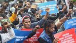 Aksi Warga Papua di Patung Kuda Jakarta