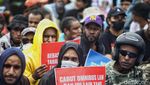 Aksi Warga Papua di Patung Kuda Jakarta