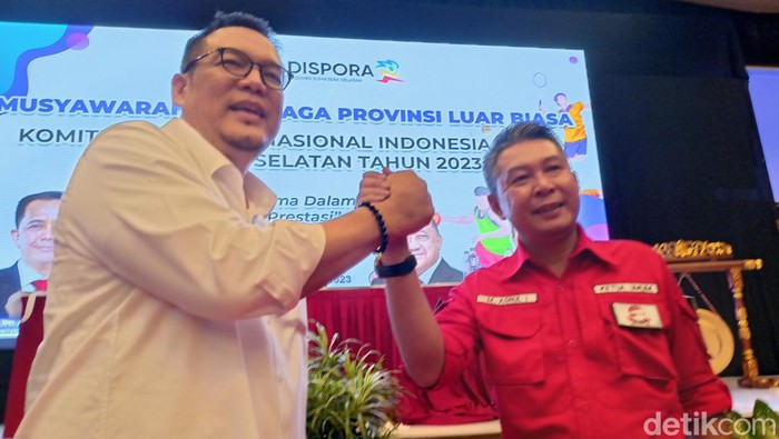 Yulian Gunhar dan Muhammad Asrul Indrawan di pemilihan Ketua KONI Sumsel.
