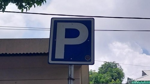 Ilustrasi pelang parkir.