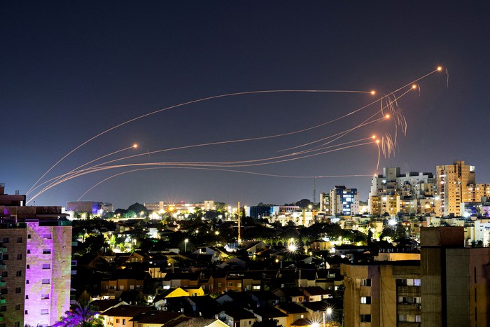 Israels Iron Dome anti-missile system intercepts rockets launched from the Gaza Strip, after a temporary truce between Israel and the Palestinian Islamist group Hamas expired, as seen from Ashkelon, Israel, December 1, 2023. REUTERS/Amir Cohen      TPX IMAGES OF THE DAY