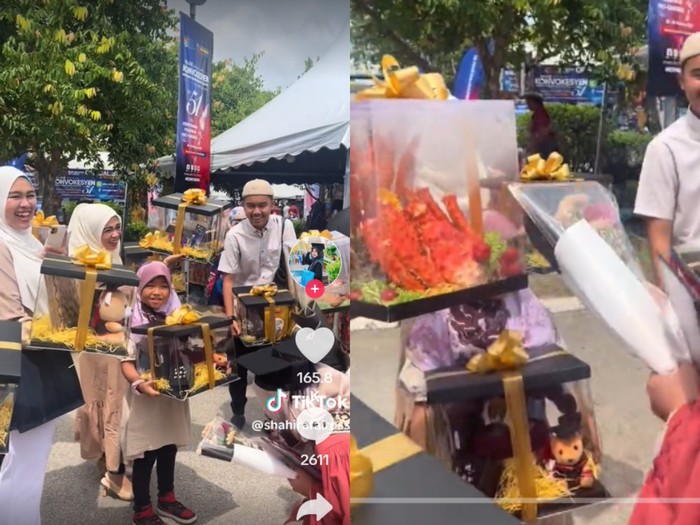 Wanita ini mendapatkan hantaran makanan di hari wisudanya