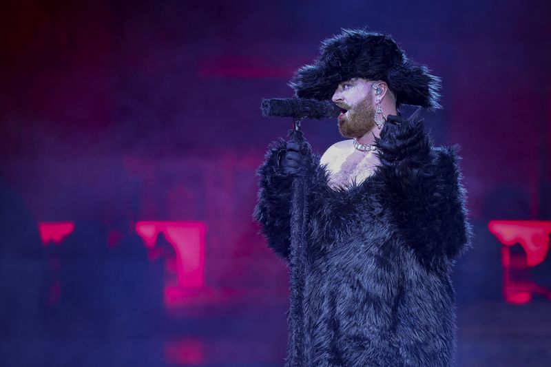 Sam Smith performs during for the Christian Cowan Spring/Summer 2024 womenswear fashion collection presented Thursday, Sept. 28, 2023 in Paris. (AP Photo/Vianney Le Caer)