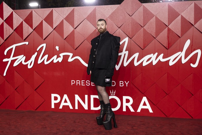 Sam Smith poses for photographers upon arrival at the British Fashion Awards on Monday, Dec. 4, 2023 in London. (Vianney Le Caer/Invision/AP)