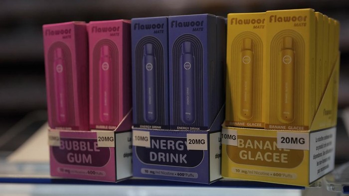 Disposable electronic flavored cigarette devices are displayed for sale at a tobacco shop in Fontainebleau, south of Paris, France, Monday, Dec. 4, 2023. The National Assembly in France is preparing for a pivotal vote on Monday night on a bill to ban single-use, disposable electronic cigarettes, commonly known as 
