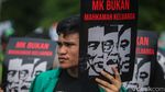 Aksi Peringatan Hari HAM dan Antikorupsi di Patung Kuda