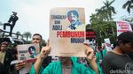 Aksi Peringatan Hari HAM dan Antikorupsi di Patung Kuda