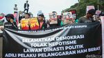 Aksi Peringatan Hari HAM dan Antikorupsi di Patung Kuda