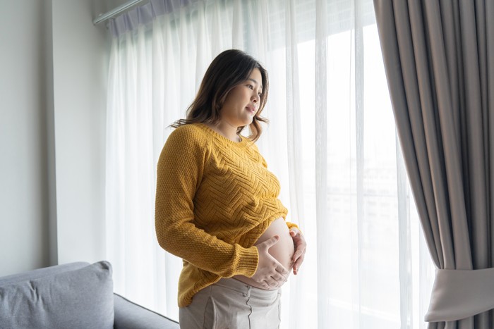 worried pregnant woman concerned and anxious woman in pregnancy overthinking worrying aboutÂ pregnancy problemÂ Pregnancy depression Mental health concept