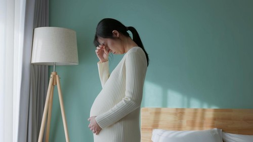 worried pregnant woman concerned and anxious woman in pregnancy overthinking worrying aboutÂ pregnancy problemÂ Pregnancy depression Mental health concept