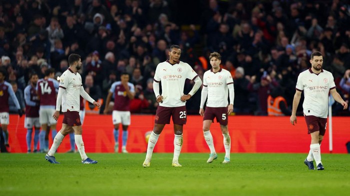 Soccer Football - Premier League - Aston Villa v Manchester City - Villa Park, Birmingham, Britain - December 6, 2023  Manchester Citys Manuel Akanji looks dejected after Aston Villas Leon Bailey scores their first goal Action Images via Reuters/Andrew Boyers NO USE WITH UNAUTHORIZED AUDIO, VIDEO, DATA, FIXTURE LISTS, CLUB/LEAGUE LOGOS OR LIVE SERVICES. ONLINE IN-MATCH USE LIMITED TO 45 IMAGES, NO VIDEO EMULATION. NO USE IN BETTING, GAMES OR SINGLE CLUB/LEAGUE/PLAYER PUBLICATIONS.