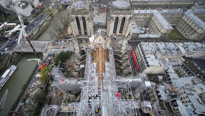 Notre Dame de Paris cathedral is pictured from the top of the spire Friday, Dec. 8, 2023 in Paris, France. French President Emmanuel Macron is visiting Notre Dame Cathedral on Friday, marking the one-year countdown to its reopening in 2024 following extensive restoration after the fire four years ago. Macron’s visit, continuing his annual tradition since the blaze on April 15 2019, is aimed to highlight the progress in the works, including the near completion of the cathedral spire.     Christophe Ena/Pool via REUTERS