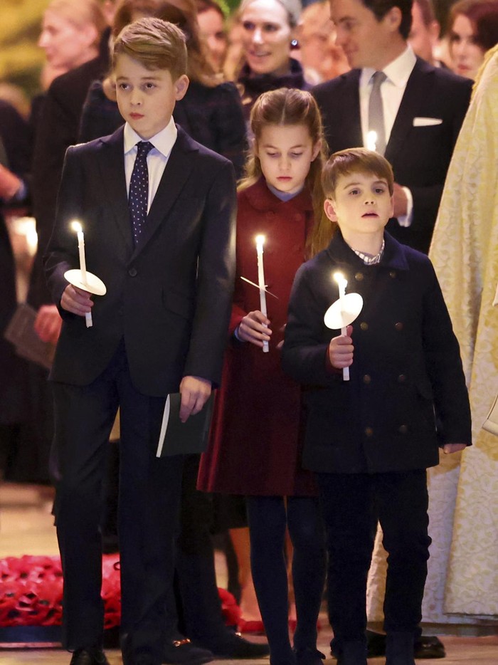 Britains Kate, Princess of Wales, with her children Princess Charlotte and Prince Louis attend the Together At Christmas carol service at Westminster Abbey in London, Friday, Dec. 8, 2023. Spearheaded by The Princess of Wales and supported by The Royal Foundation, the service is a moment to bring people together at Christmas time and recognise those who have gone above and beyond to help others throughout the year. (Chris Jackson/Pool via AP)