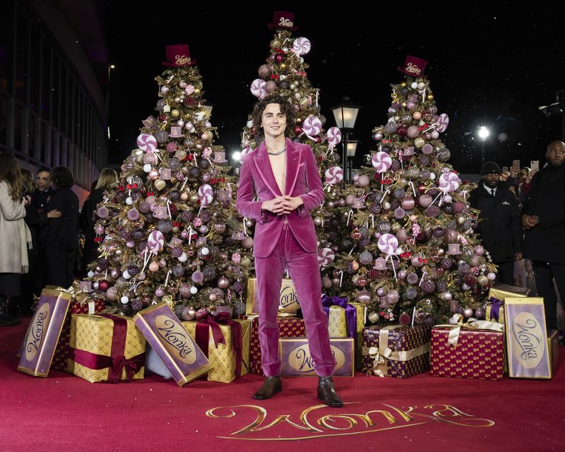 Timothee Chalamet poses for photographers upon arrival at the world premiere of the film 'Wonka' on Tuesday, Nov. 28, 2023 in London. (Scott Garfitt/Invision/AP)