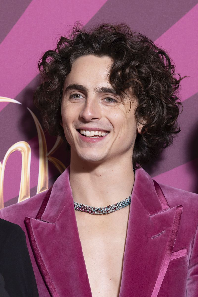 Timothee Chalamet poses for photographers upon arrival at the world premiere of the film 'Wonka' on Tuesday, Nov. 28, 2023 in London. (Scott Garfitt/Invision/AP)