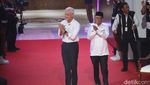 Potret Kostum Khas Capres-Cawapres di Debat Perdana