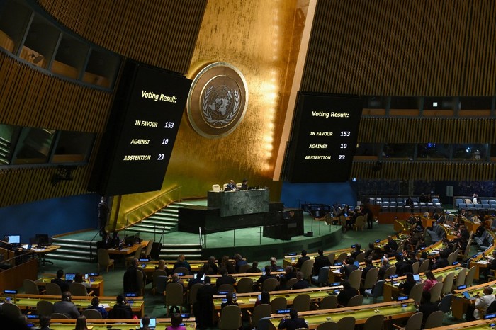 A general view shows voting results during a United Nations General Assembly meeting to vote on a non-binding resolution demanding 