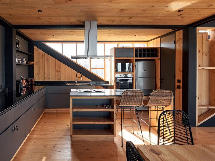 Rumah di sisi bukit/Cristóbal Palma via Dezeen