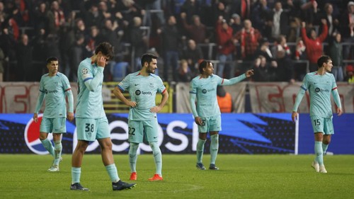Players of Barcelona react after Royal Antwerps George Ilenikhena scored his sides third goal during the Champions League Group H soccer match between Antwerp and Barcelona at the Bosuil stadium in Deurne, Belgium, Wednesday, Dec. 13, 2023. (AP Photo/Geert Vanden Wijngaert)