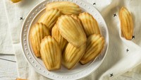 Madeleine belakangan populer di kafe dessert. Dessert berbentuk krang ini juga memiliki penyebutan nama yang cukup sulit, yaitu maah-duh-line. Foto: Getty Images/iStockphoto