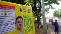 Banner Caleg terpaku pada pohon juga ditemukan di Jalan Ngagel, Wonokromo.