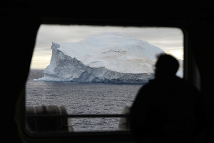 Penguins stand near the Chilean OHiggins base in Antarctica, Friday, Nov. 24, 2023. (AP Photo/Jorge Saenz)