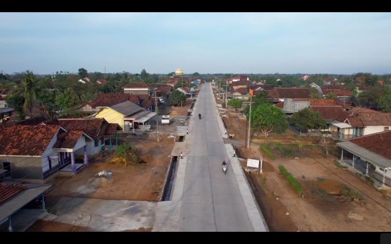 Jalanan ruas Simpang Randu-Seputih Surabaya, melintasi Rumbia, di Lampung Tengah. (Dok BPJN Lampung, Kemen PUPR)