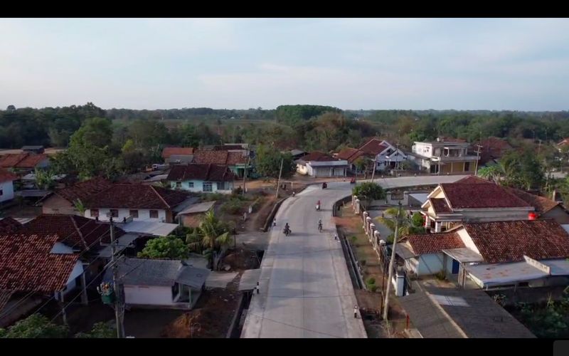 Jalanan ruas Simpang Randu-Seputih Surabaya, melintasi Rumbia, di Lampung Tengah. (Dok BPJN Lampung, Kemen PUPR)