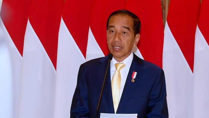 Momen Jokowi berdasi kuning